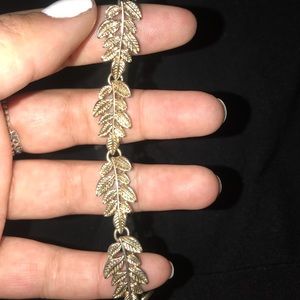 Gold and black leaf choker.